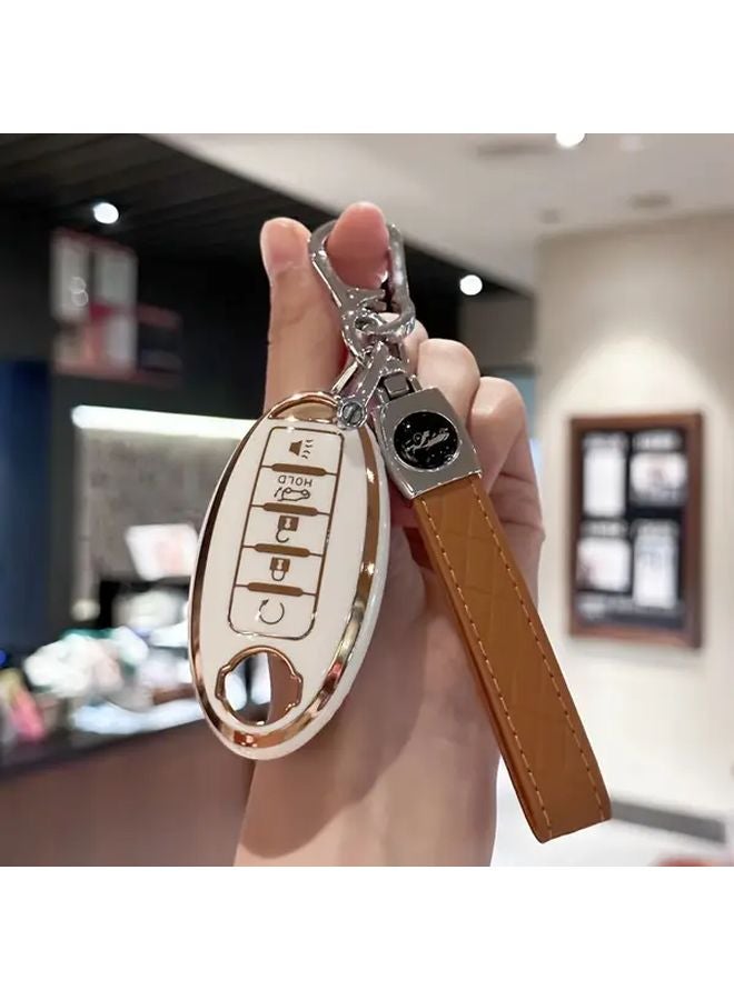 غطاء مفتاح وردي مع إطار ذهبي لسيارات نيسان ماكسيما، روج، أرمادا، باثفايندر، فيرسا - Image 1